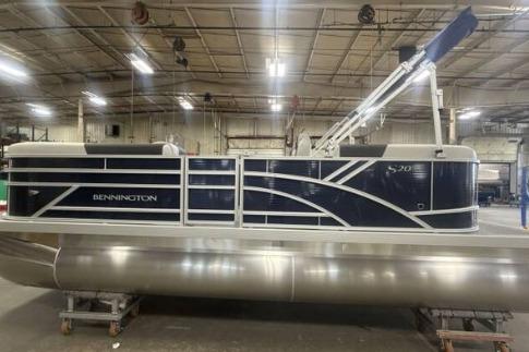 Bennington SSR 2026 Bennington SSR pontoon boat in a warehouse setting.