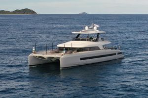 Lagoon SIXTY 7 2023 Lagoon SIXTY 7 yacht cruising on open sea near island.