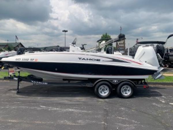 Tahoe 2150 Deck Boat CC 2023 Tahoe 2150 Deck Boat CC on trailer, parked outdoors under cloudy sky.