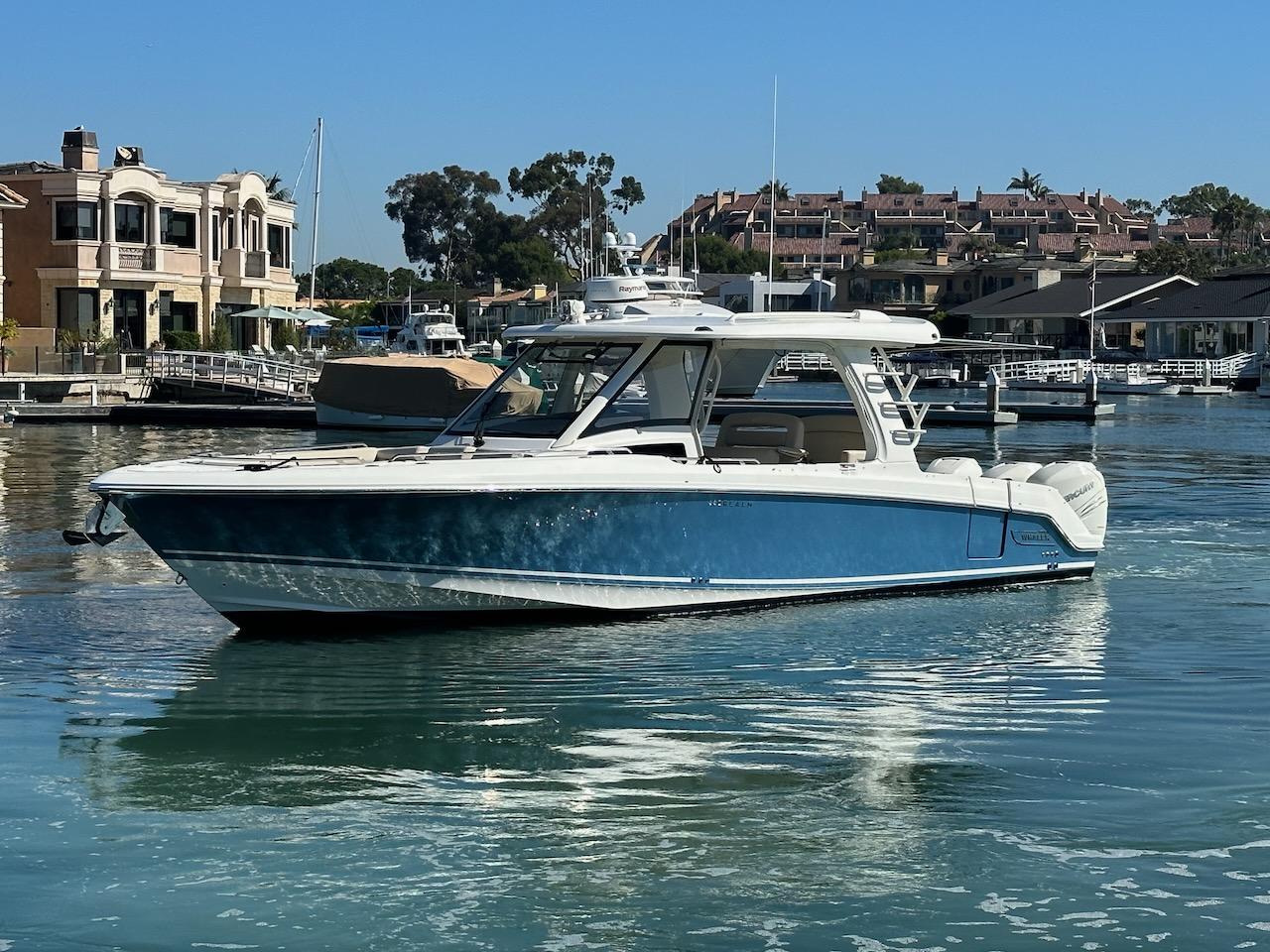 Boston Whaler 350 Realm 2019 Boston Whaler 350 Realm boat docked in a scenic marina.
