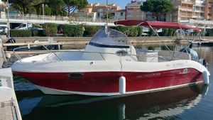 Pacific Craft 800 sun cruiser 2008 Pacific Craft 800 Sun Cruiser docked in a marina, featuring a sleek red and white design.