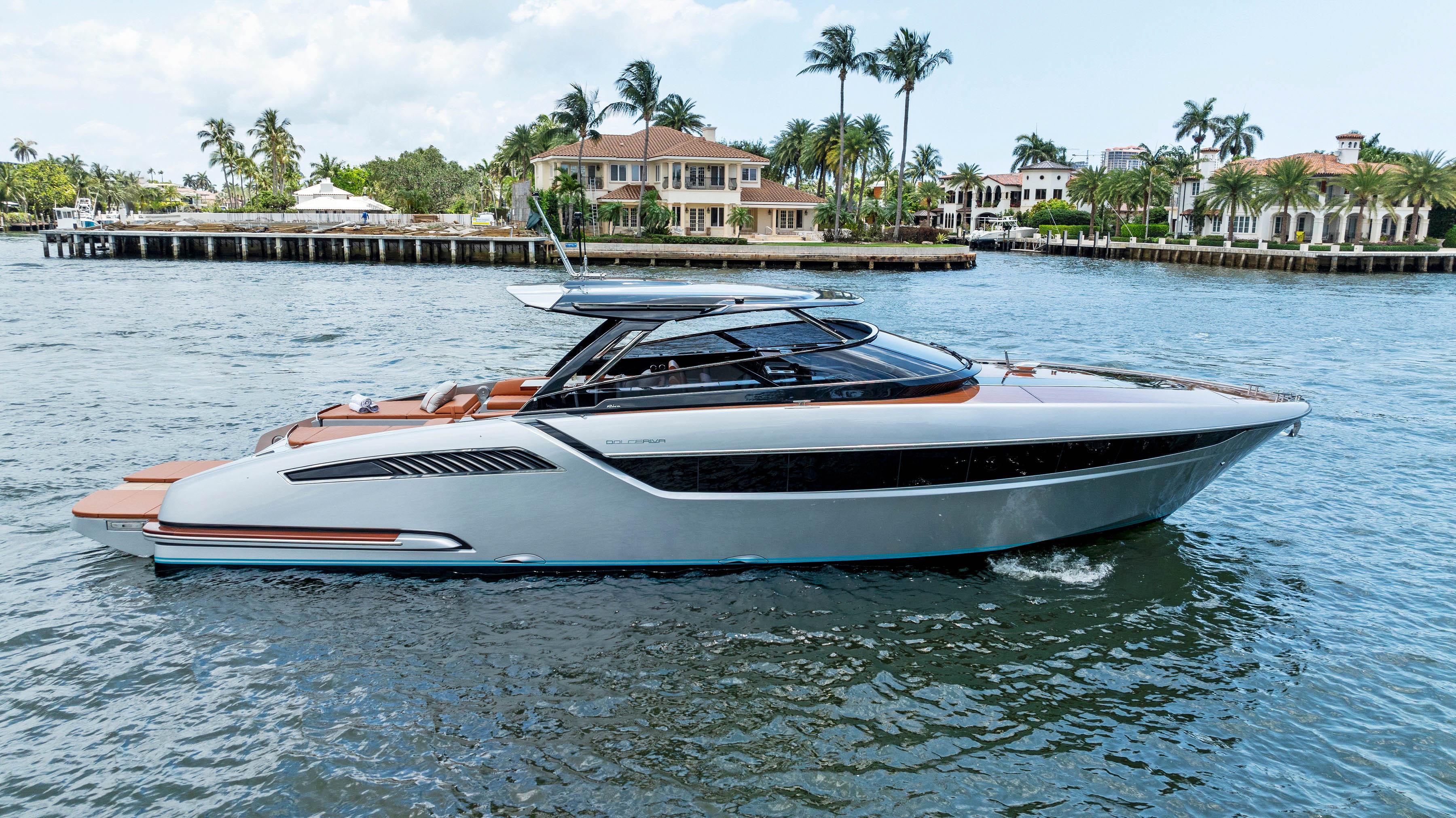 Riva 48' DOLCERIVA 2024 Riva 48' Dolceriva luxury yacht cruising on open water.