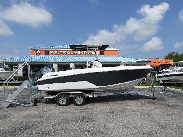 Wellcraft 202 Fisherman 2024 Wellcraft 202 Fisherman boat on trailer at Nautical Ventures dealership.