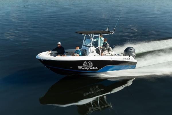 Wellcraft 202 Fisherman 2024 Wellcraft 202 Fisherman boat cruising on calm water with passengers.