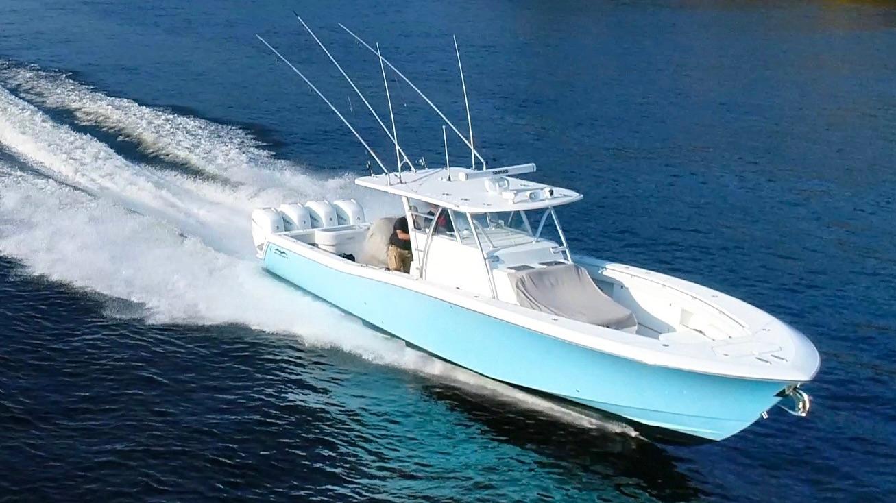 Invincible 42 Center Cabin 2018 Invincible 42 Center Cabin boat cruising on blue water.