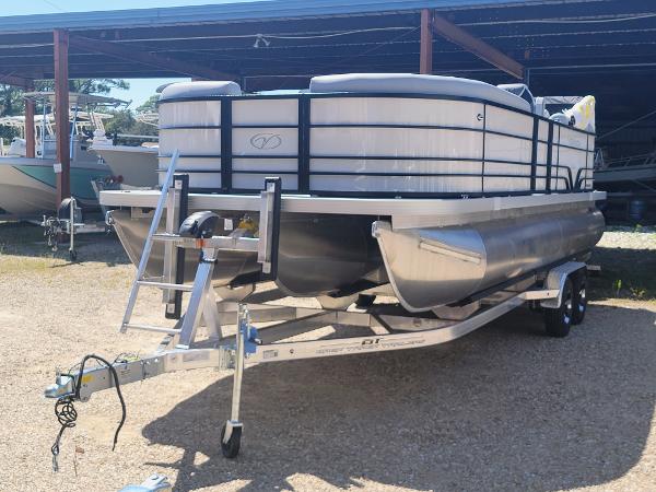 Veranda 22 Vista View RC 2024 Veranda 22 Vista View RC pontoon boat on a trailer in a boatyard.