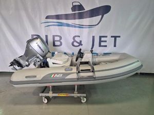 AB Inflatables Lammina 9 AL 2024 AB Inflatables Lammina 9 AL boat with Honda outboard motor on display.