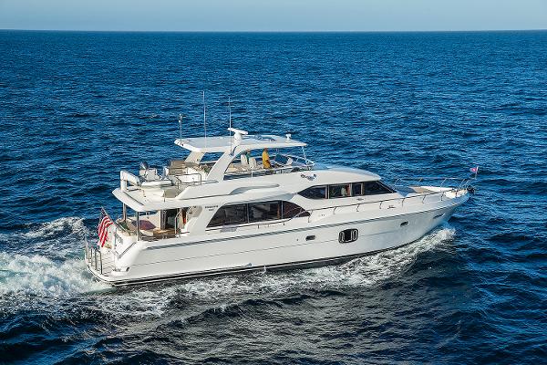 Hampton 650 Pilothouse 2026 Hampton 650 Pilothouse yacht cruising on open sea.