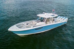 Pursuit S 428 Sport 2022 Pursuit S 428 Sport boat cruising on open water.