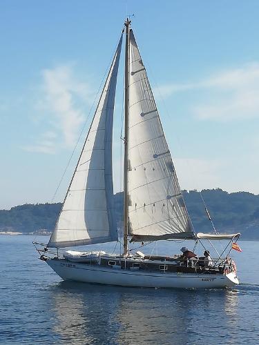 Custom Scirocco 31 MK II 1979 Custom Scirocco 31 MK II sailboat on calm waters.