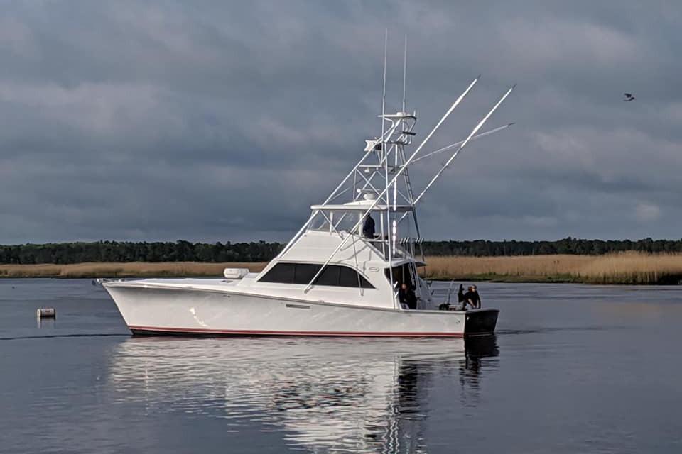 Ocean Yachts 55 Super Sport 1982/2016 Ocean Yachts 55 Super Sport 1982 model on calm water under cloudy sky.