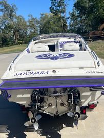 1997 Scarab 38 purple hurricane