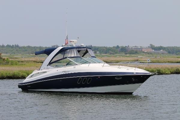 Cruisers Yachts 330 Express 2009 Cruisers Yachts 330 Express on calm water, showcasing sleek design and luxury features.