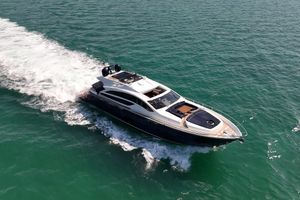 Pershing 82 Luxurious 2013 Pershing 82 yacht cruising on open sea, showcasing sleek design and elegance.