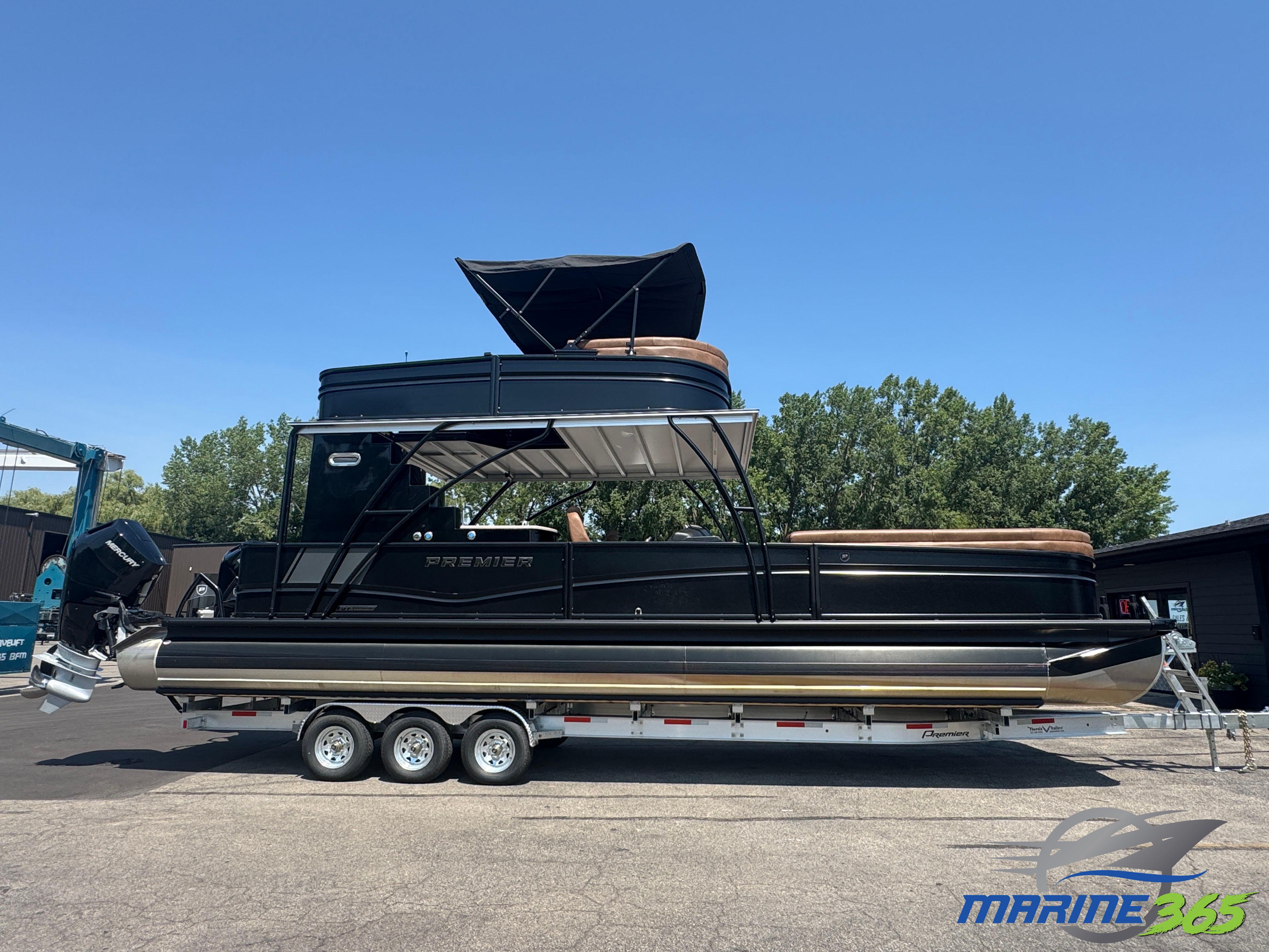 Premier Escalante 2026 Premier Escalante pontoon boat on trailer, displayed outdoors under clear blue sky.