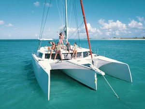 NEEL 43 Group enjoying on NEEL 43 trimaran, 2021 model, sailing in clear turquoise waters.