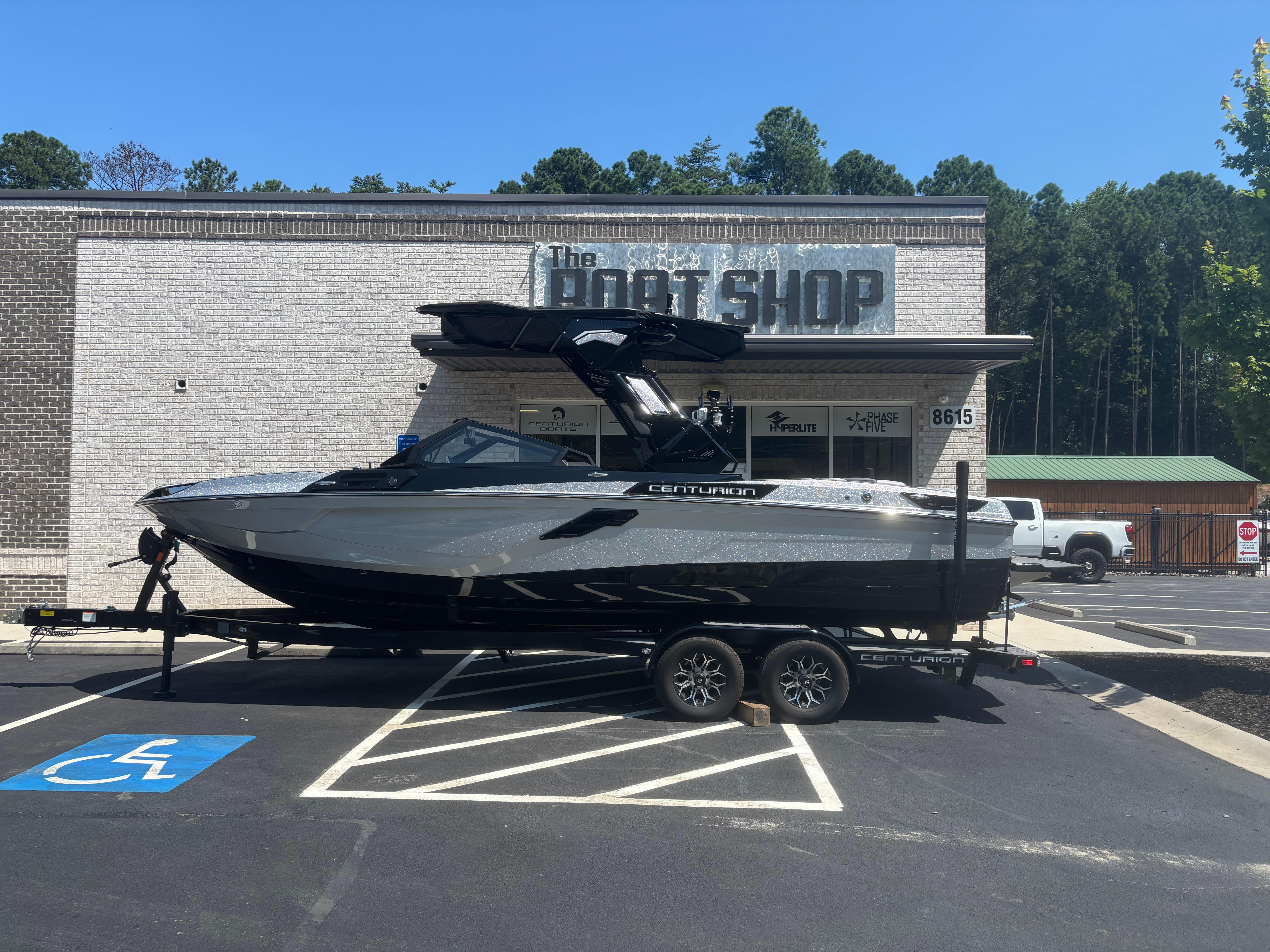 Centurion Ri245 2025 Centurion Ri245 boat on trailer outside The Boat Shop.