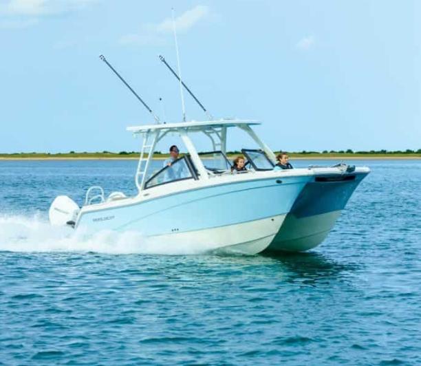 World Cat 265 DC-X 2026 World Cat 265 DC-X boat cruising on open water, clear sky background.