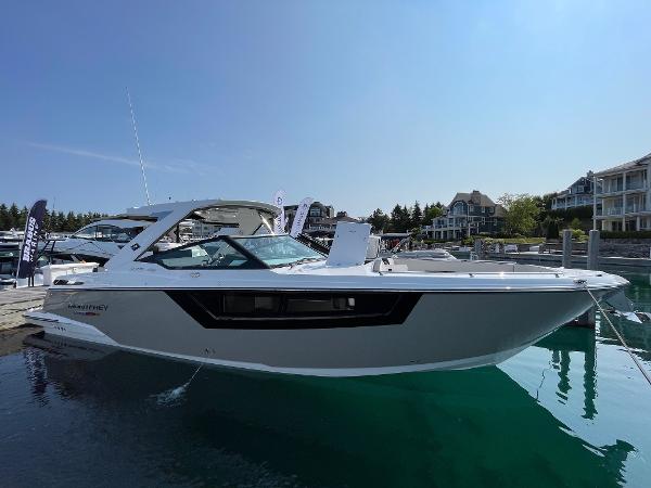 Monterey 378 Super Sport 2023 Monterey 378 Super Sport boat docked in a marina.