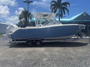 Sea Fox 288 Traveler 2026 Sea Fox 288 Traveler boat on trailer, parked outdoors under clear sky.