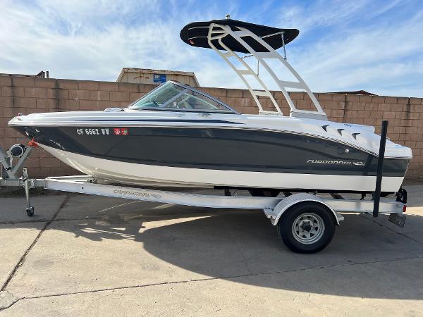 Chaparral 19 H2O Sport 2017 Chaparral 19 H2O Sport boat on trailer, parked outdoors.