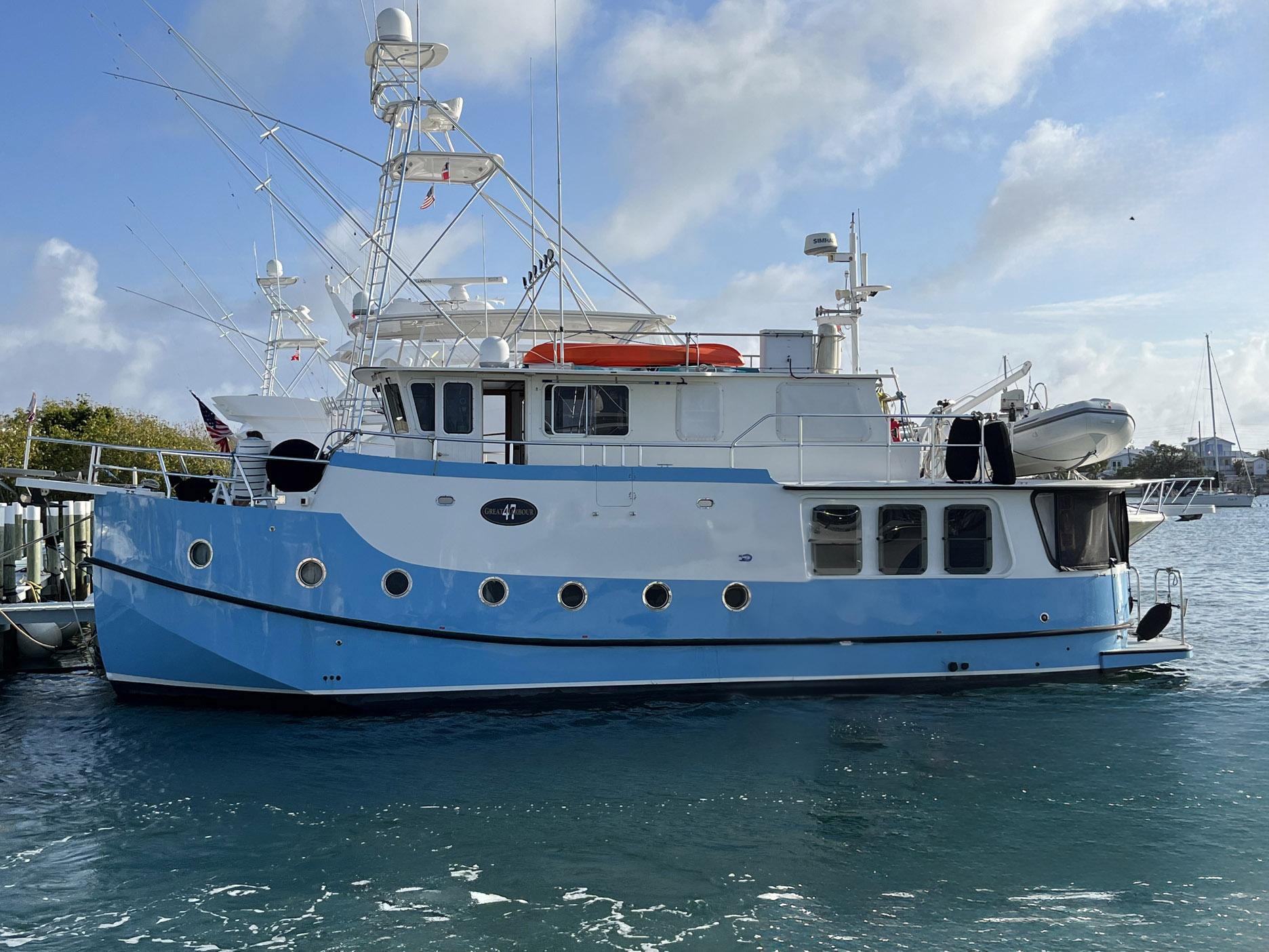 Great Harbour GH47 2001 Great Harbour GH47 yacht docked in a marina, blue and white exterior.