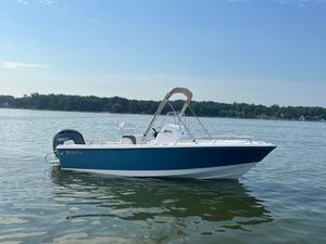 Edgewater 188CC 2026 Edgewater 188CC boat on calm lake waters under clear sky.