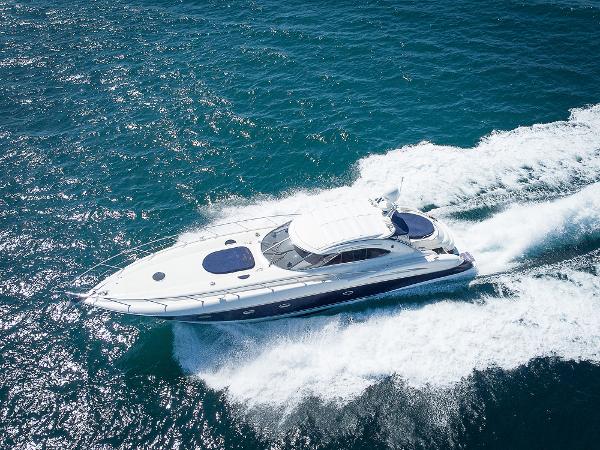 Sunseeker Predator 58 Sunseeker Predator 58 yacht cruising on open water, 1999 model.