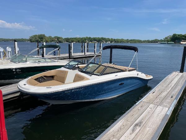 Sea Ray SPX 190 2020 Sea Ray SPX 190 boat docked on a sunny lake.