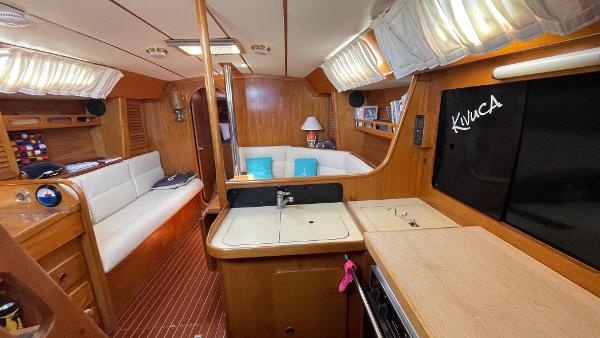Custom Brisa 40 Interior of 1992 Custom Brisa 40 yacht with cozy seating and wooden finishes.