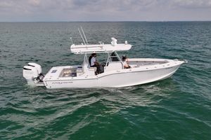 Ocean Master 31 Center Console 1996 Ocean Master 31 Center Console boat cruising on open water.