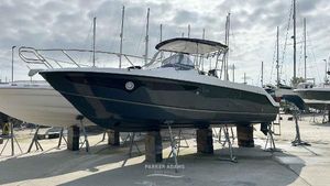Galeon Galia 770 Sundeck 2023 Galeon Galia 770 Sundeck boat on stands in a marina setting.