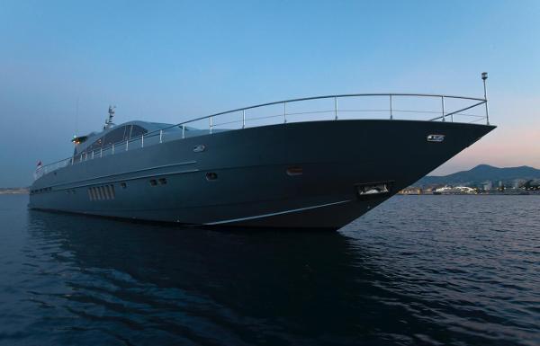 Leopard 27 Luxury Leopard 27 yacht from 2002 on calm waters at dusk.