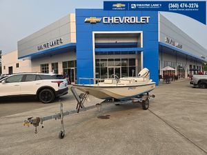 Boston Whaler SUPER SPORT LIMITED 1987 Boston Whaler SUPER SPORT LIMITED boat on trailer at Chevrolet dealership.