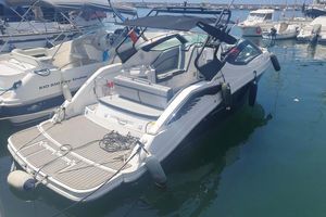 Fibrafort 270 GTO 2023 Fibrafort 270 GTO boat docked in a marina, featuring sleek design and spacious deck.