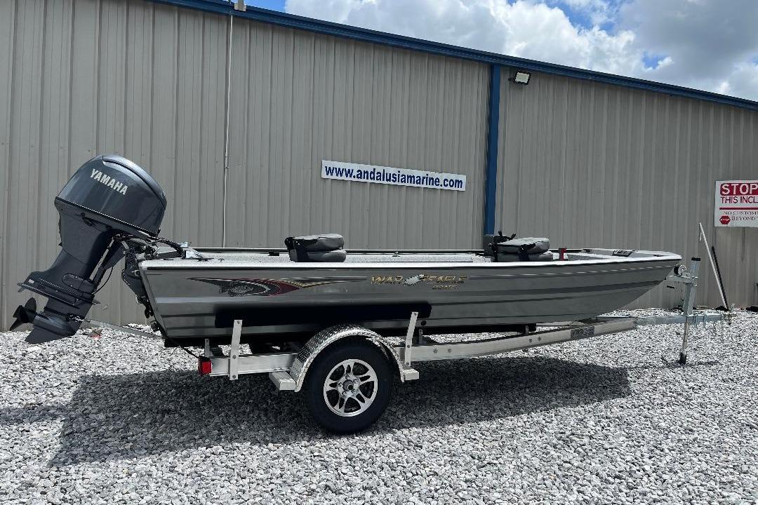 War Eagle 754VS Stick Steer 2026 War Eagle 754VS Stick Steer boat with Yamaha motor on a trailer.