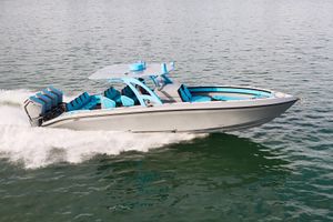 Midnight Express 37' Open 2024 Midnight Express 37' Open boat cruising on water, featuring sleek design and powerful engines.