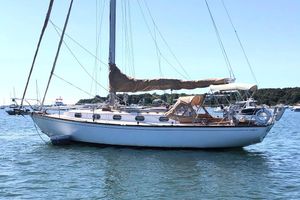 Cape Dory 36 1979 Cape Dory 36 sailboat anchored in a scenic harbor.