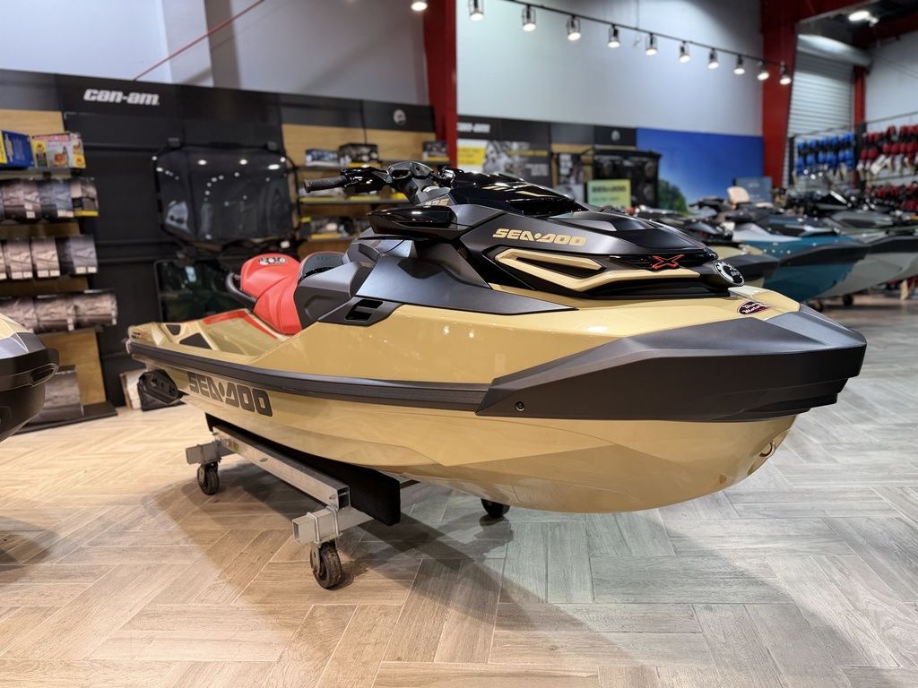 Sea-Doo RXT-X™ 325 Metallic Tan / Lava Red Premi 2025 Sea-Doo RXT-X™ 325 in Metallic Tan and Lava Red on display in showroom.