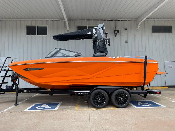 Nautique Super Air Nautique G21 2023 Nautique Super Air Nautique G21 boat in vibrant orange on trailer.