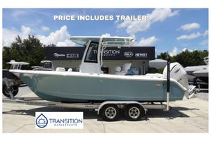 Sea Hunt Ultra 235 SE 2026 Sea Hunt Ultra 235 SE boat with trailer at Transition Watersports dealership.