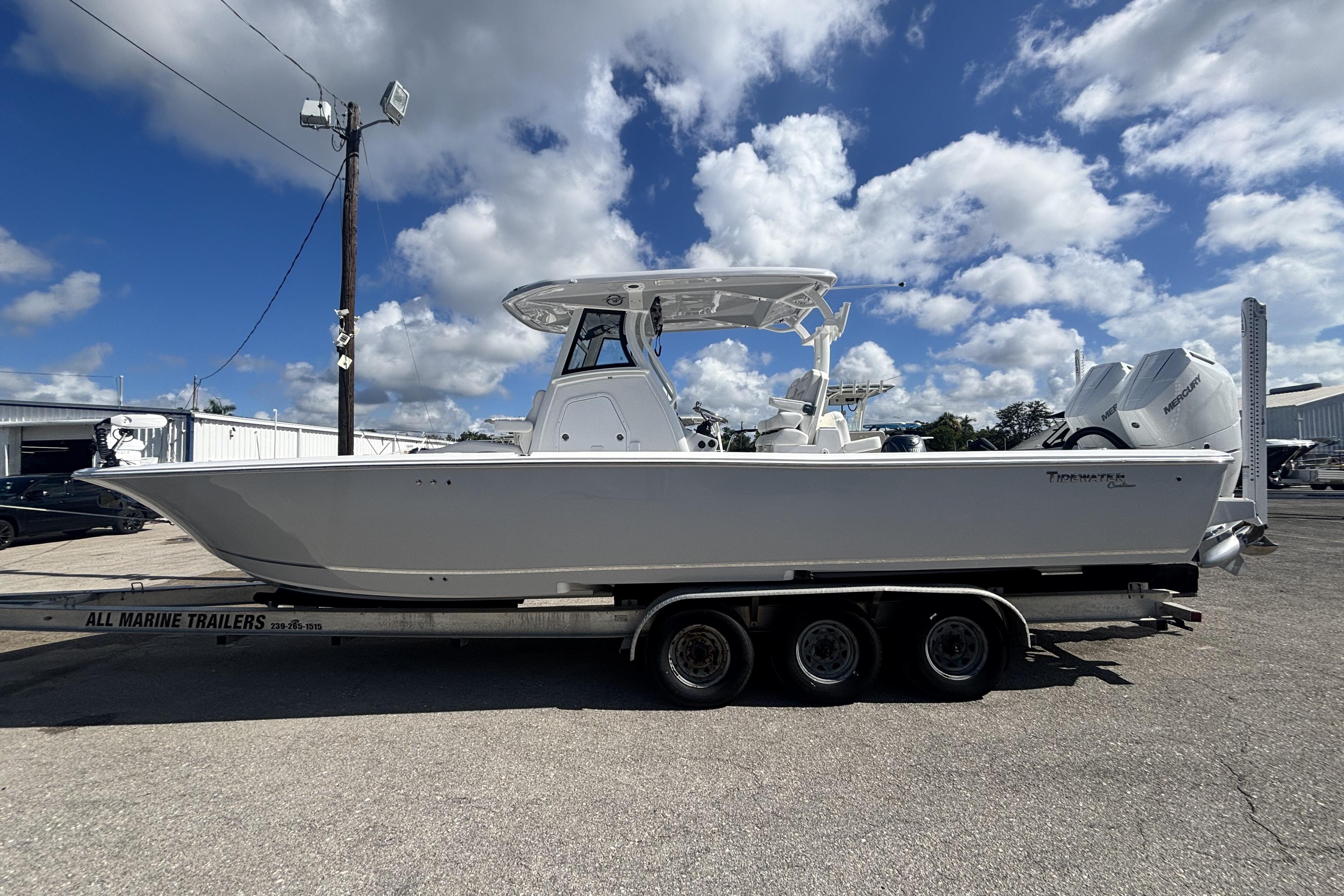 Tidewater 3100 Carolina Bay 2026 Tidewater 3100 Carolina Bay boat on trailer under a blue sky.