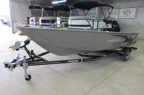 Smoker Craft Freedom 160 TL 2023 Smoker Craft Freedom 160 TL boat on trailer in showroom.