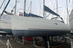 Beneteau Oceanis 31 2010 Beneteau Oceanis 31 sailboat for sale, displayed on stands in a boatyard.