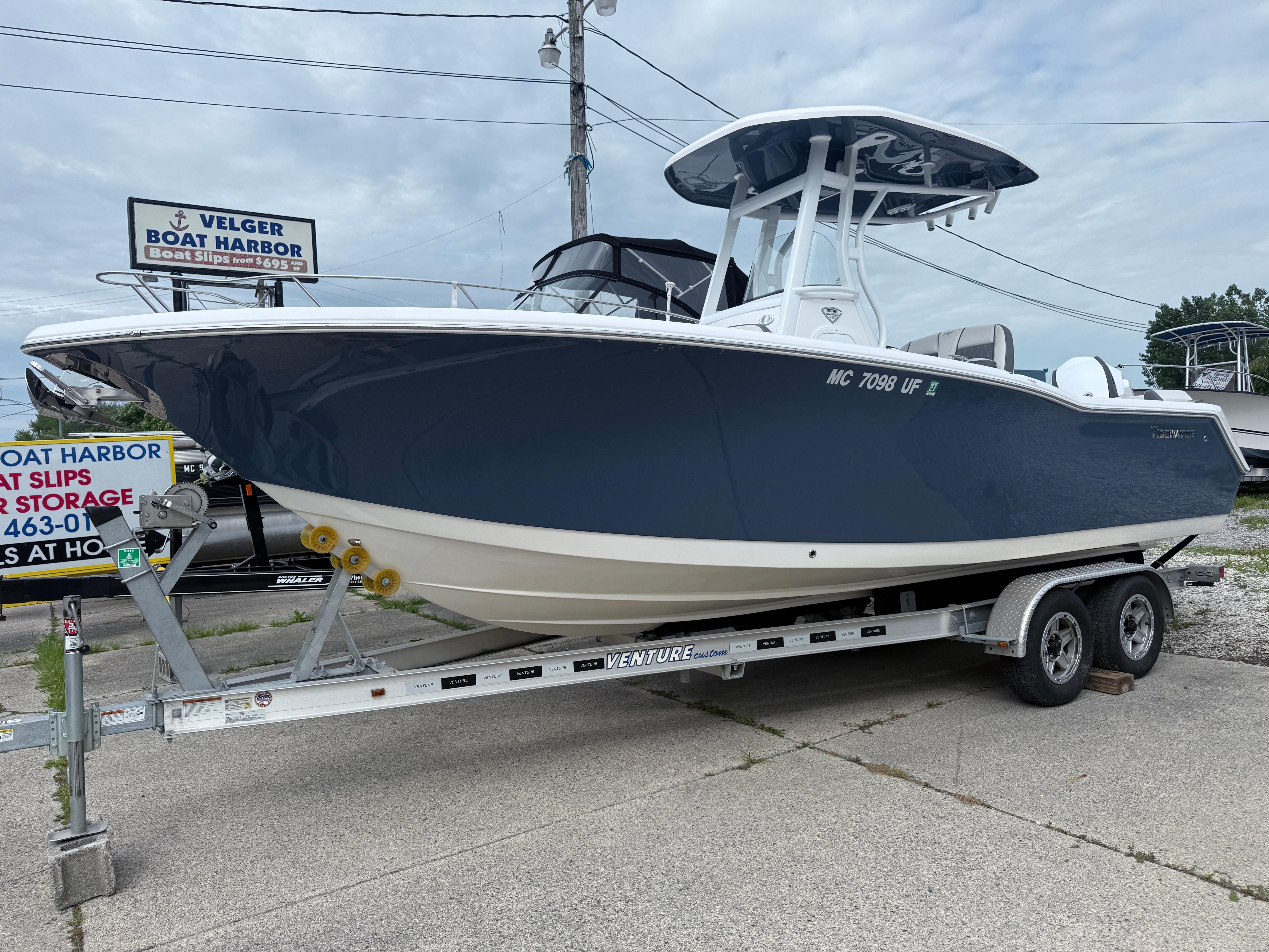 Tidewater 232 LXF 2018 Tidewater 232 LXF boat on trailer at Velger Boat Harbor.