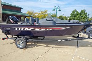 Tracker Pro Guide V-16 SC 2026 Tracker Pro Guide V-16 SC boat on trailer, outdoor setting.