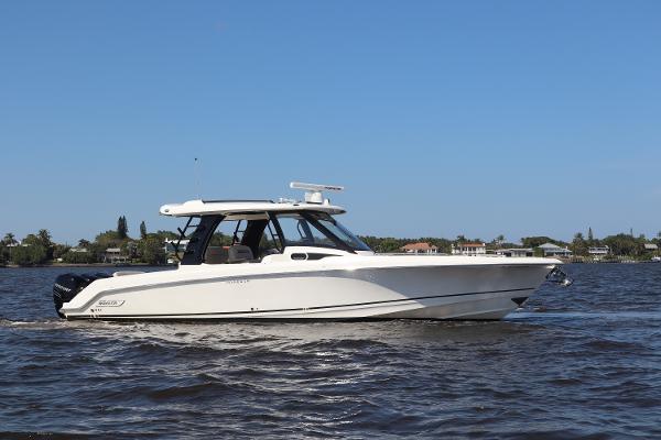 Boston Whaler 350 Realm 2023 Boston Whaler 350 Realm cruising on a sunny day.