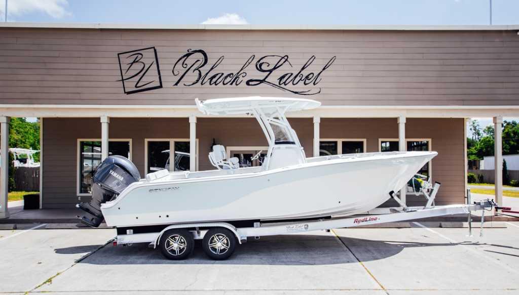 Sea Fox 248 Commander 2021 Sea Fox 248 Commander boat on trailer outside Black Label building.