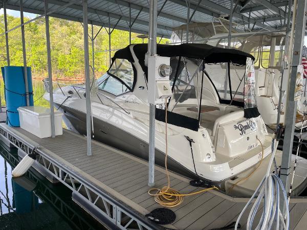 Sea Ray 320 Sundancer 2007 Sea Ray 320 Sundancer docked under a covered marina.