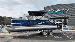 Sylvan L-3 CLZ 2025 Sylvan L-3 CLZ pontoon boat on trailer at Avalanche Motorsports dealership.